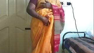 desi  indian horny tamil telugu kannada malayalam hindi cheating wife vanitha wearing orange colour saree  showing chubby bosom and shaved pussy press hard bosom press nip rubbing pussy defilement